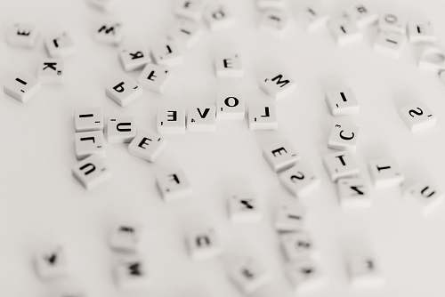 computer hardware shallow focus photo of scrabble pieces computer